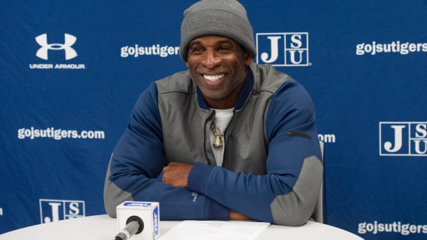 Deion Sanders answers questions at a SWAC press conference.